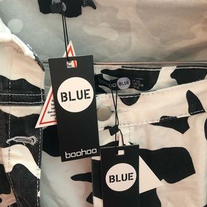 Matching cow print jacket and button up skirt